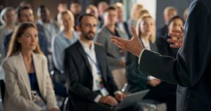 business leader talking to employees