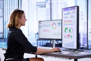 professional analyzing data on computer