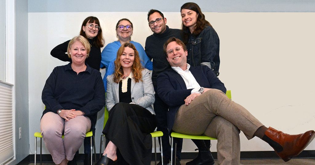 Adriana Milko with four female and two male clinicians with whom she interned at Braver Medical in East Providence, Rhode Island.