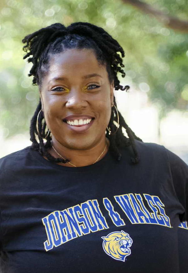 Portrait of Starlisha Keith wearing her Johnson & Wales t-shirt.