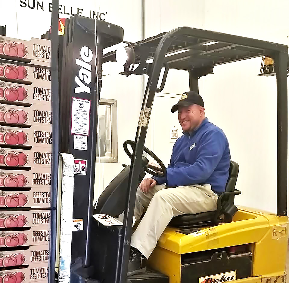 Joe Presler operating a forklift.