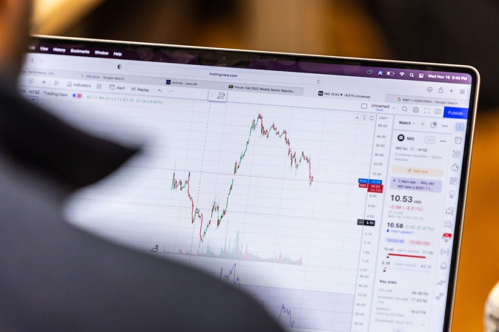 Computer screen displaying a stock market trend chart. 
