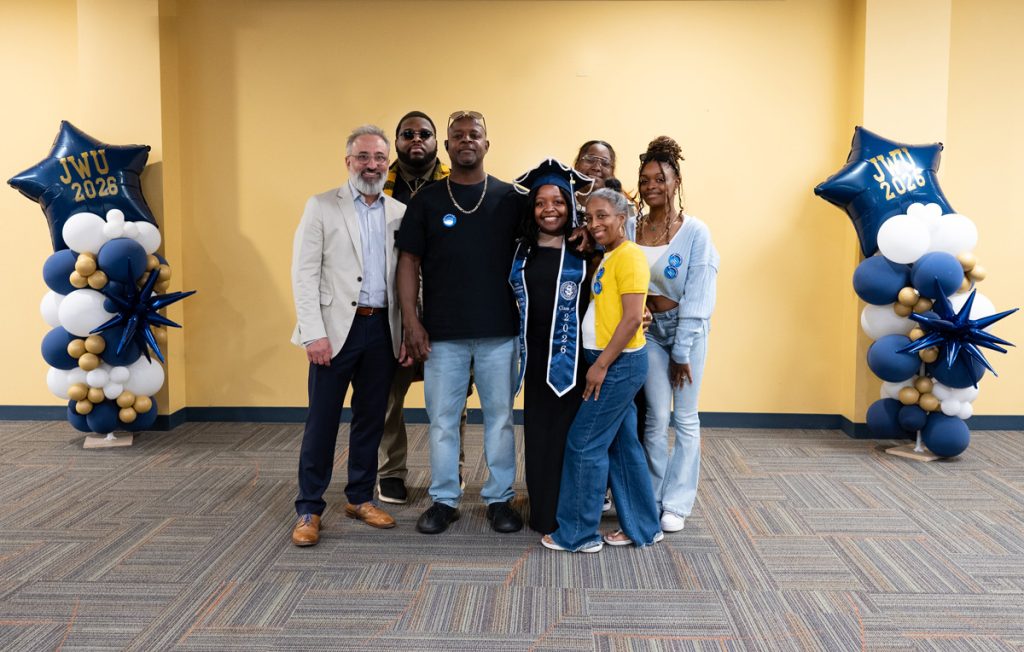Graduating student Maiya McLain and family with Angelo Pitassi, Director of Corporate Relations, at the JWU Online Senior Toast.