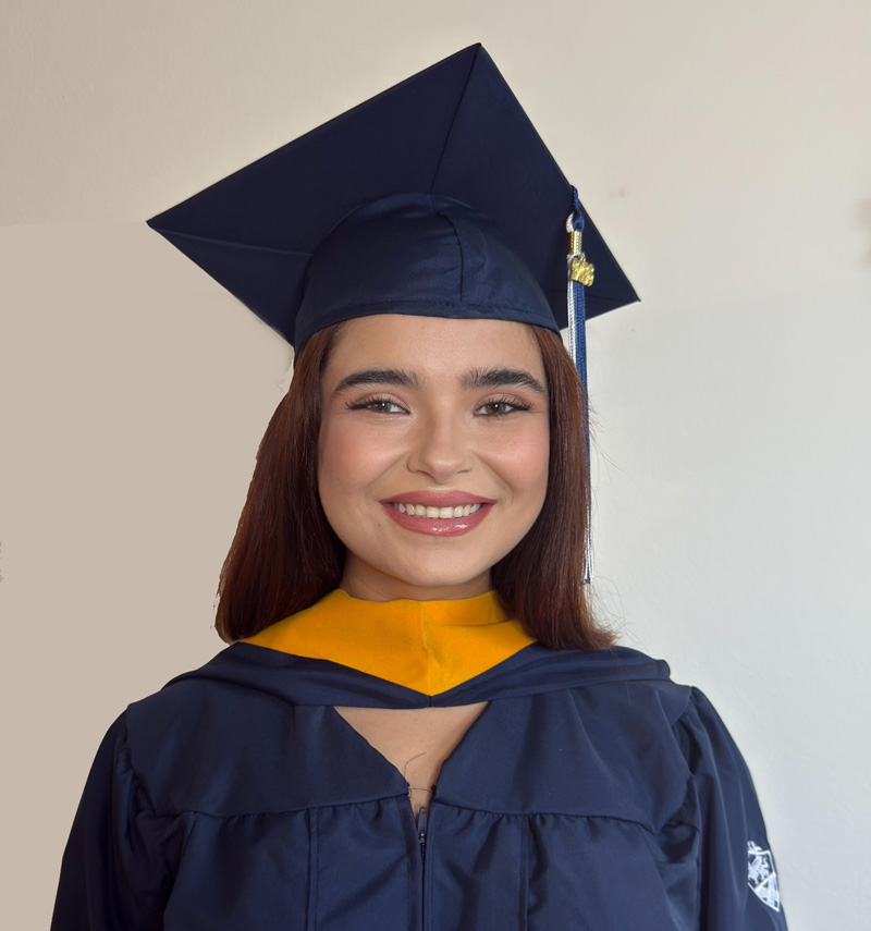 Headshot of Hannah Levy in cap and gown.